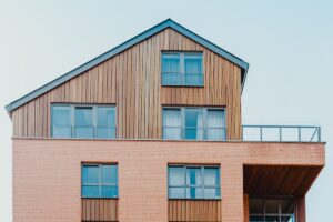 low-angle photo of brown house